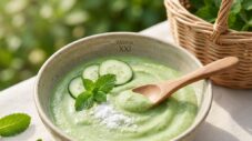 A bowl of fresh cucumber cream, representing natural and water-based skin care for a refreshing summer routine for moms.